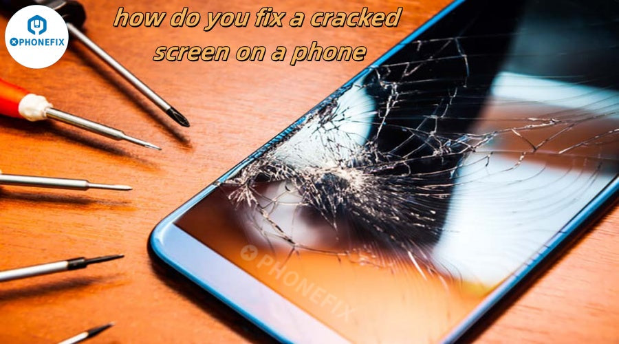 Cracked smartphone screen with repair tools on wooden table, mobile phone repair concept