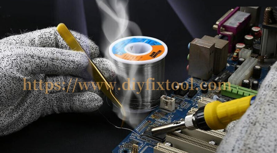 Close-up of soldering iron, solder wire, and tweezers repairing a computer motherboard