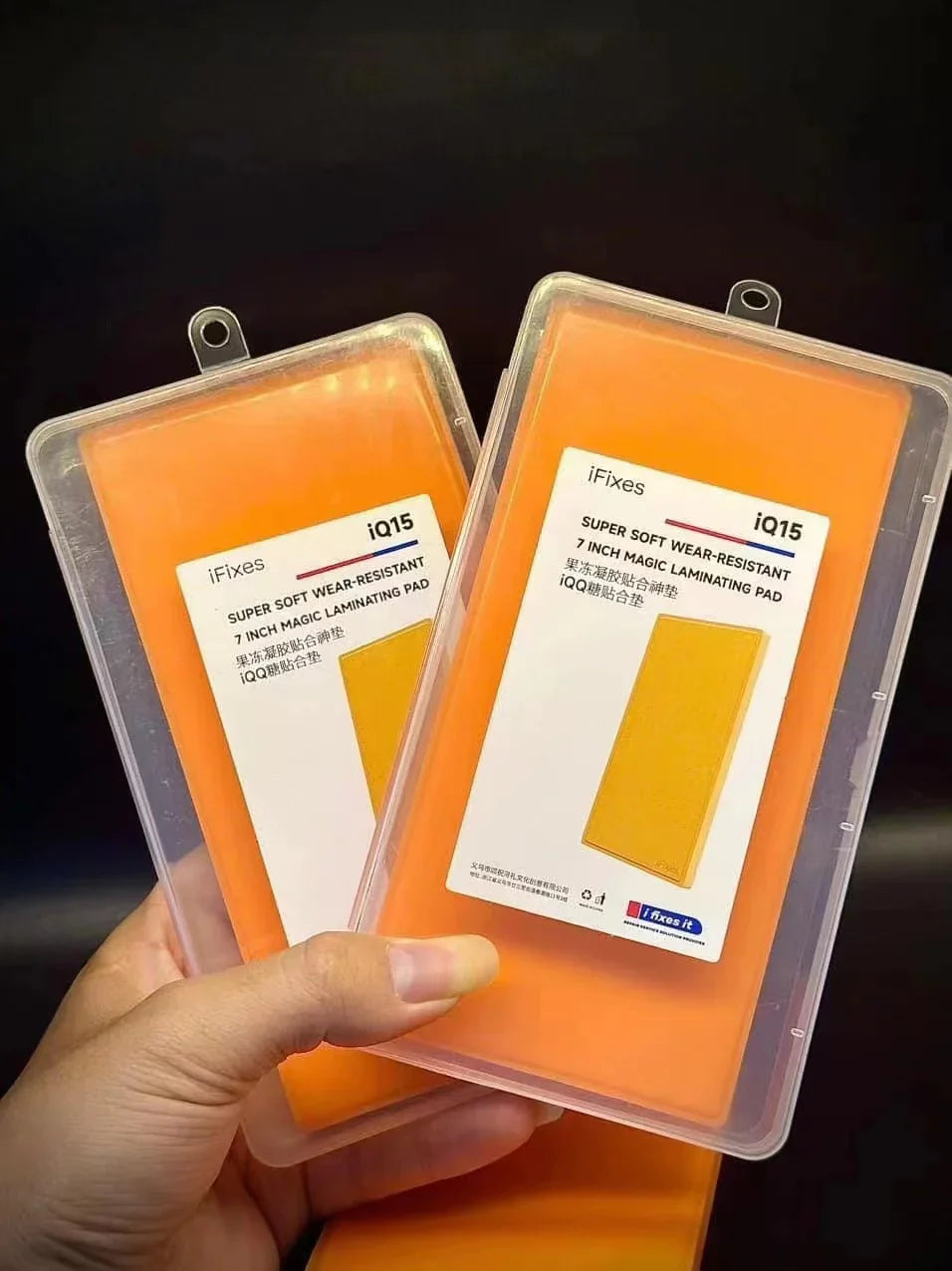 Two orange iFixes iQ15 super soft wear-resistant 7 inch laminating pads in plastic cases
