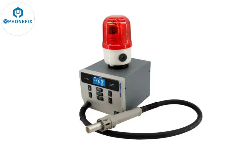 PhoneFix ATTEN ST-862D-E 1000W hot air BGA rework station with fault alarm, showing controls and hot air nozzle in use.
