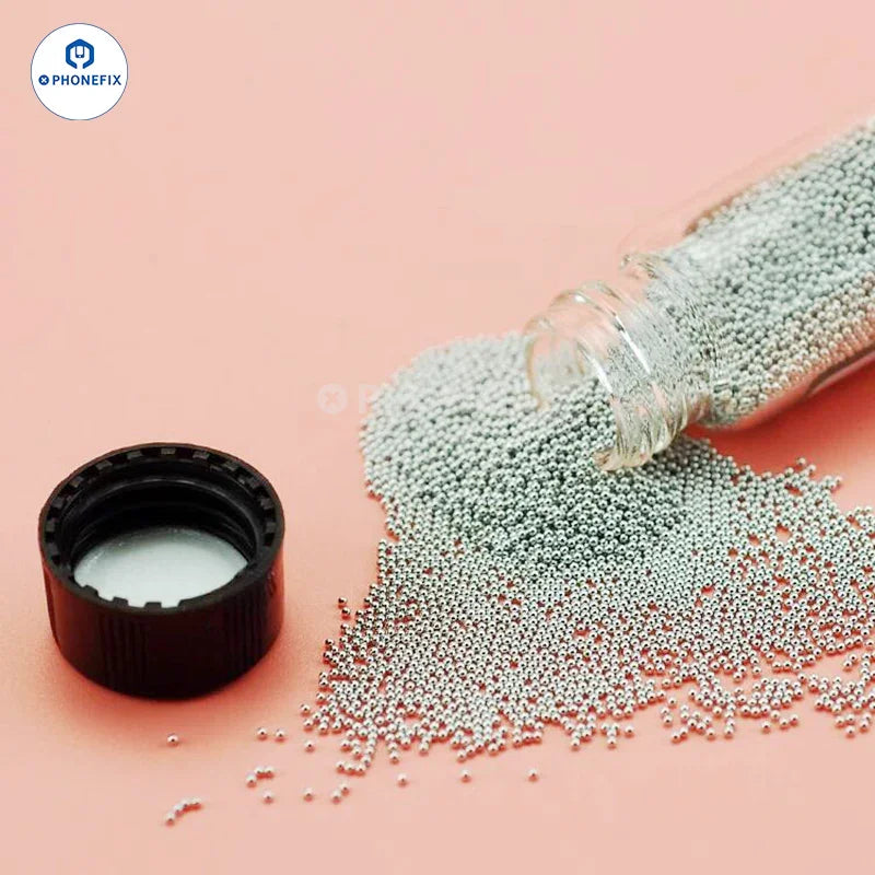 Leaded tin solder balls for BGA reballing and soldering, PHONEFIX consumables, close-up of small metallic solder particles.
