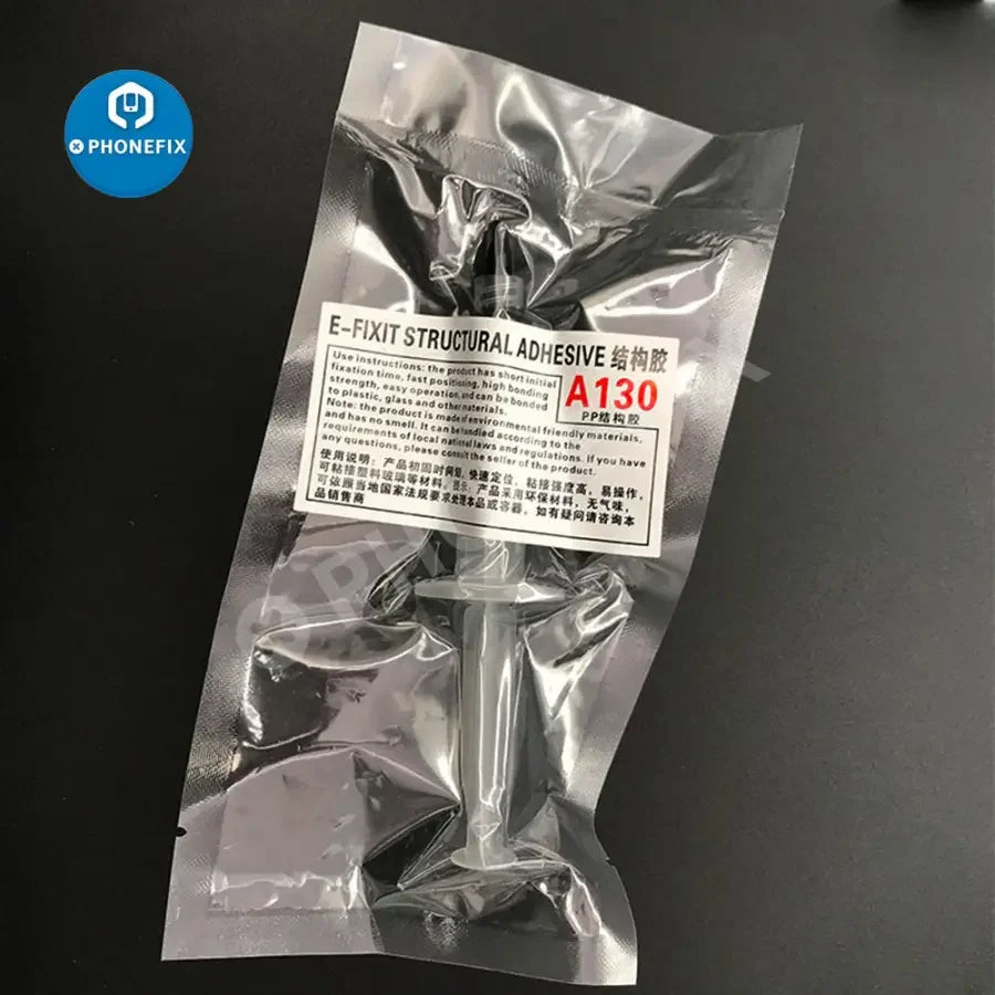 PhoneFix structural adhesive glue for iPhone back cover glass lens and LCD repair, visible in the image.