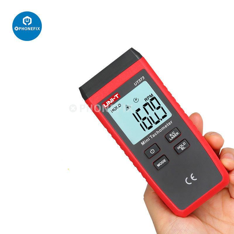 PHONEFIX UT-373 Mini Tachometer digital multimeter for non-contact rotation speed measurement, showing display and sensor in use