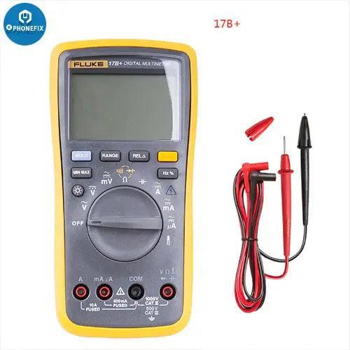 Digital multimeter from PHONEFIX featuring Fluke 15B+, 17B+, 18B+ models for voltage and frequency testing, shown in the image.