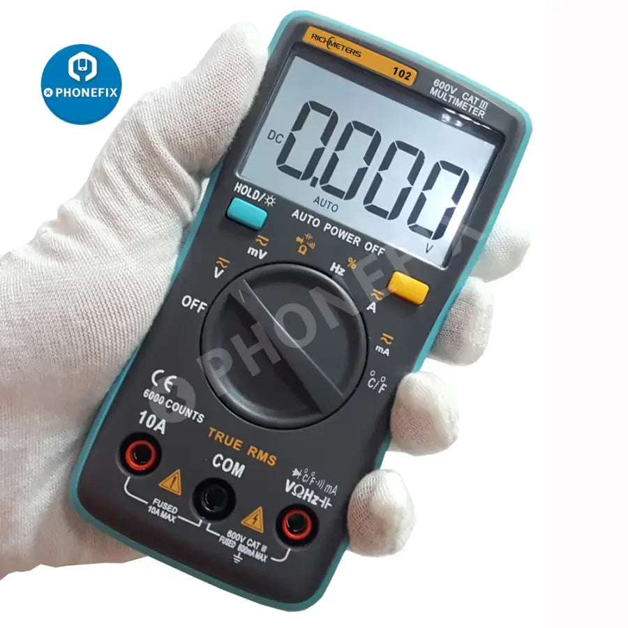 Richmeters 102 pocket digital multimeter with LCD display, testing AC/DC voltage, from PHONEFIX, ideal for electrical measurements.