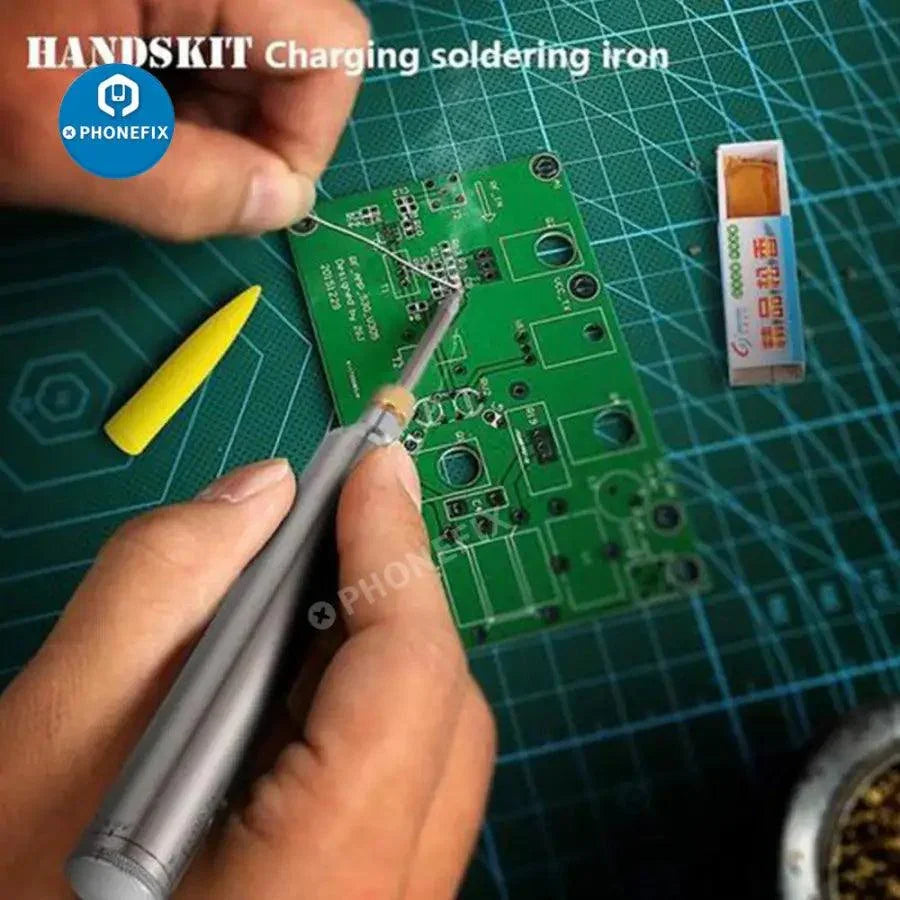 Wireless rechargeable soldering iron with 5V 8W power, featuring interchangeable tips and a compact design by PHONEFIX.