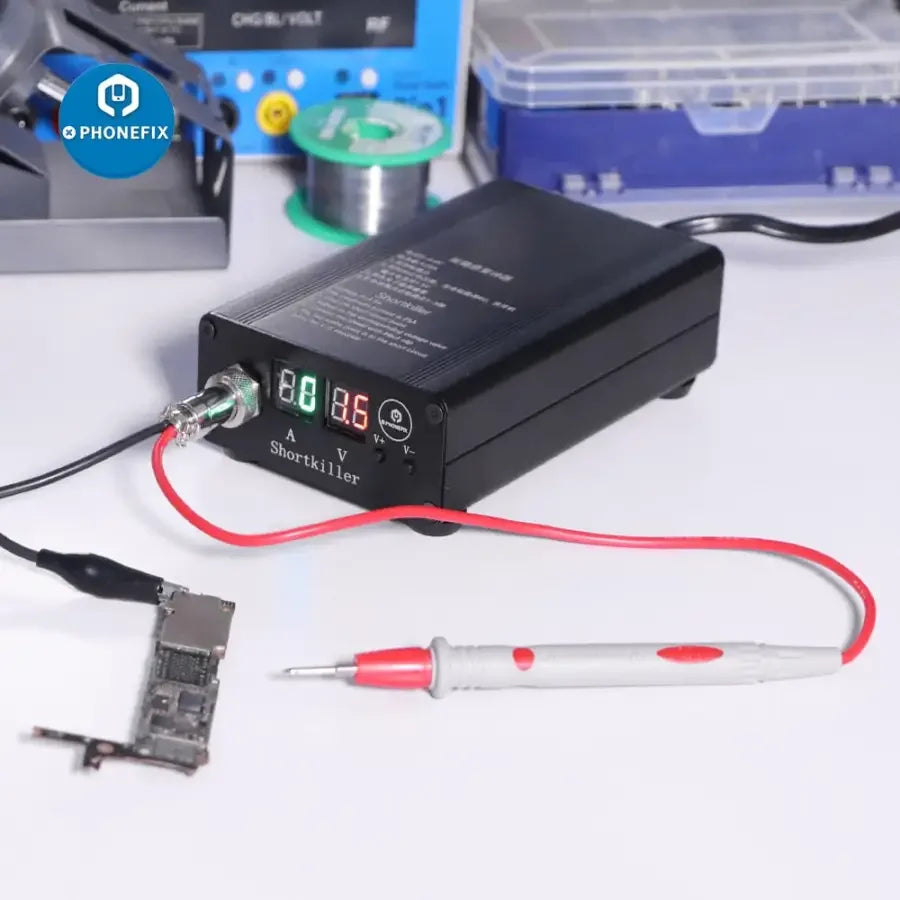 Phonefix Shortkiller burning detection box for mobile short circuit repair on PCB, used for motherboard troubleshooting.