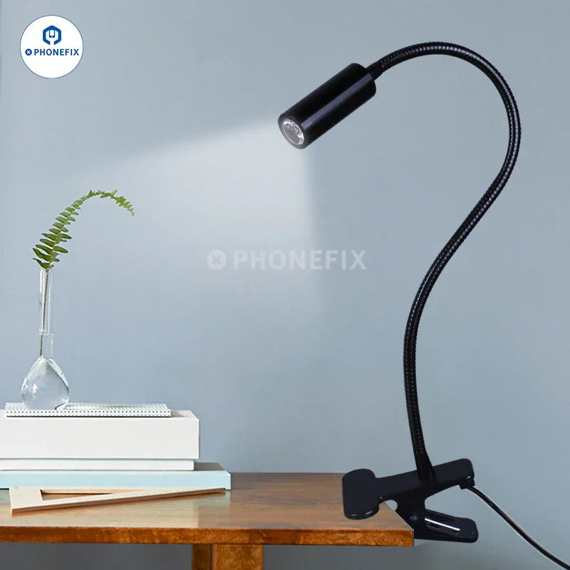 Dimmable LED ring light from PHONEFIX with adjustable brightness, perfect for eye care and reading, mounted on a clamp.