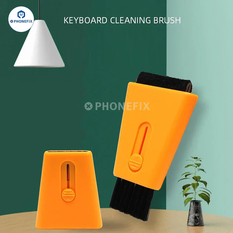 PhoneFix double-ended retractable cleaning brush for phones and keyboards, with dust removal tips and portable hand tool design.