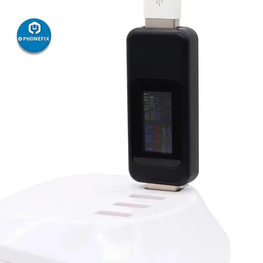 Color LCD USB charger tester by PHONEFIX displaying voltage and current readings on a digital screen.