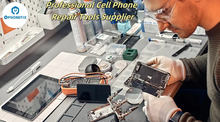Technician using mobile phone repair tools at workbench with smartphone parts and gadgets.