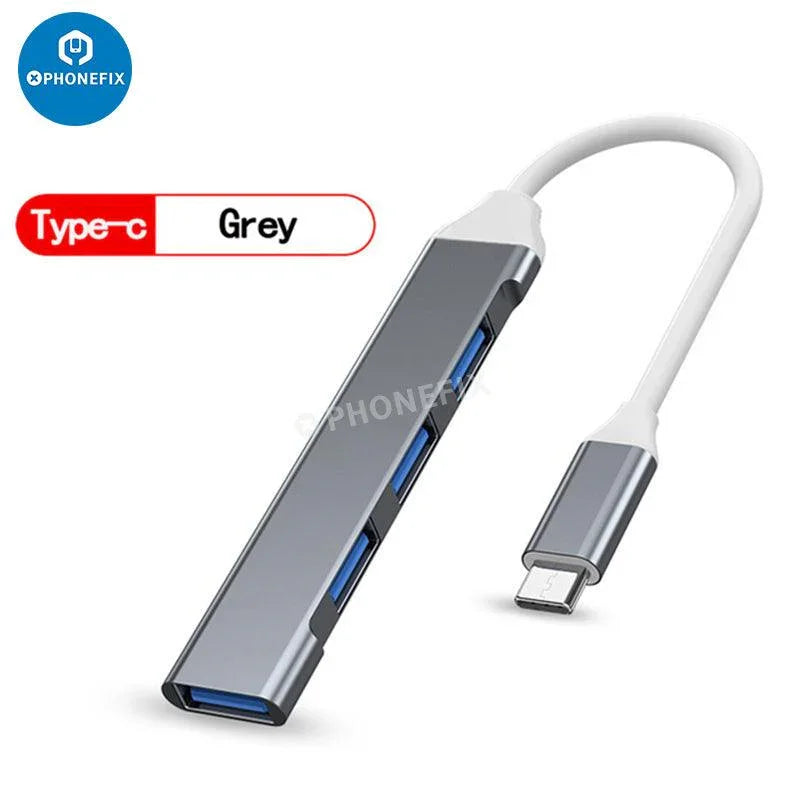 Gray 2/3/4-in-1 USB 3.0 port hub expander for phone and PC, enabling fast data transfer and device connectivity.