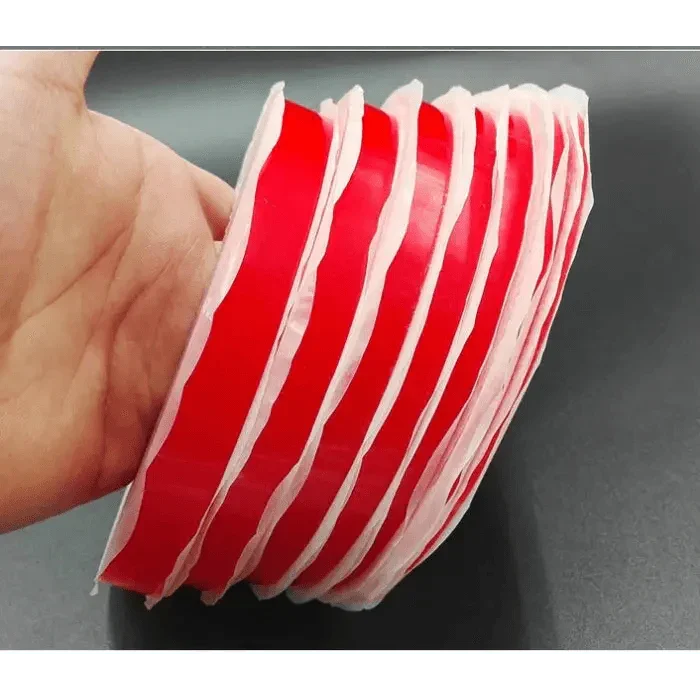 PHONEFIX acrylic PET red film clear double-sided tape for phone screen repair, showing the thin, flexible adhesive tape on a white background.
