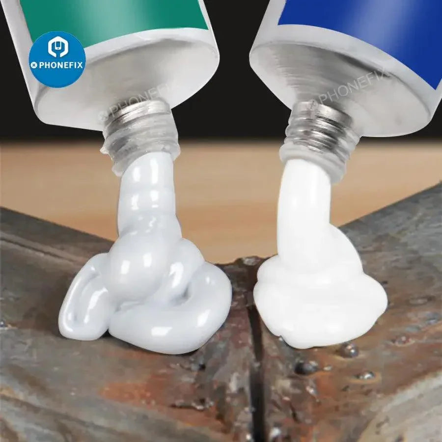 Black and transparent silicone industrial adhesive 704 RTV rubber glue by PHONEFIX, suitable for heavy-duty bonding and repairs.