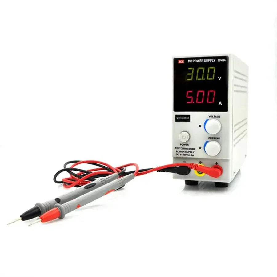 PHONEFIX MCH K305D Smart DC Power Supply with adjustable voltage, switching regulation, 110V input, and US adapter for electronics testing