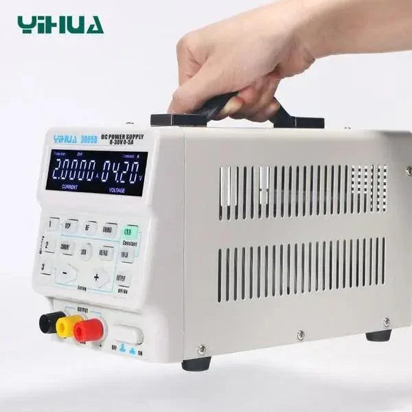 YIHUA 3005D adjustable laboratory DC power supply by PHONEFIX showing digital display and control knobs for precise voltage and current.