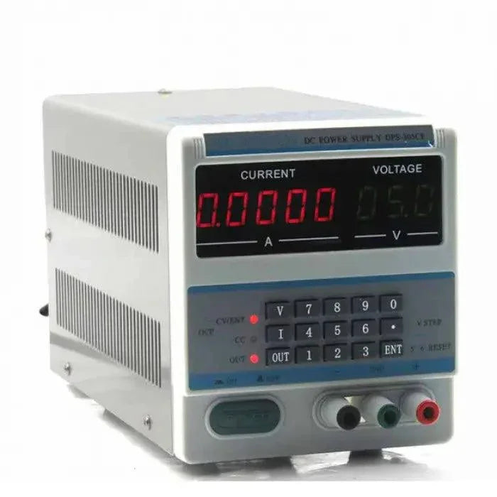 Adjustable DPS-305 DC power supply from PHONEFIX showing 0-30V and 0-5A LED display on a black unit.
