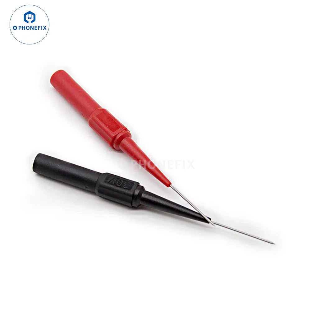Digital multimeter from PHONEFIX with needle test probes for circuit board repair and testing electrical circuits.