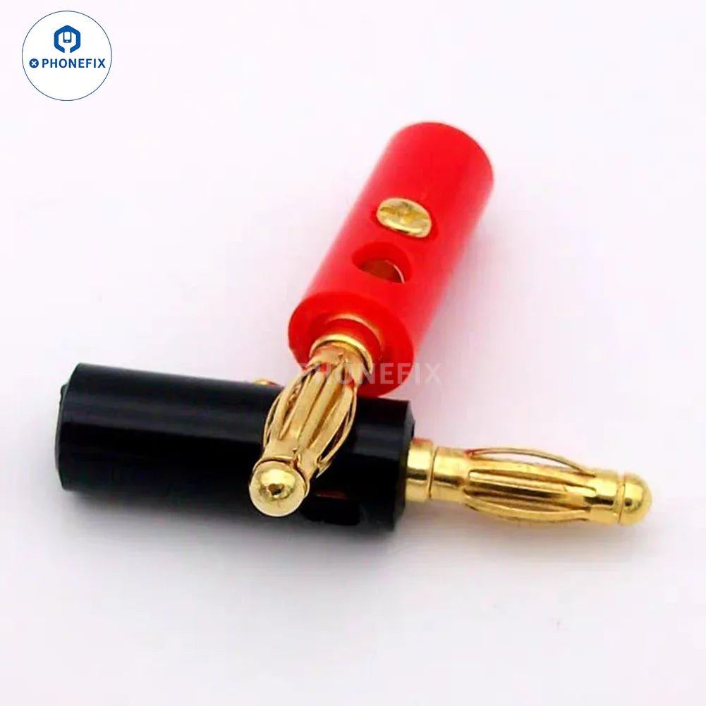 Close-up of a 4mm gold-plated brass banana plug connector for DC power supply, used with digital multimeters.
