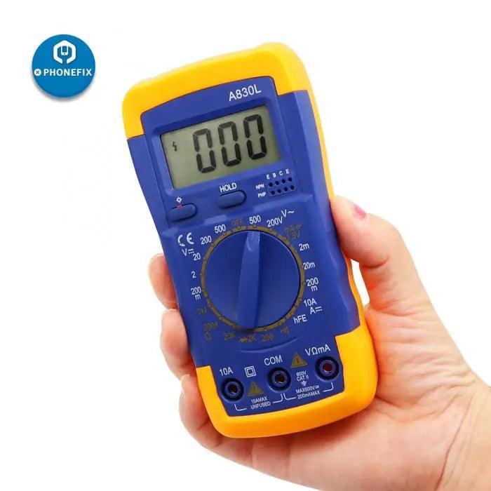 PHONEFIX A830L digital multimeter displaying AC/DC voltage, ohm resistance, and current measurement on a compact handheld device.