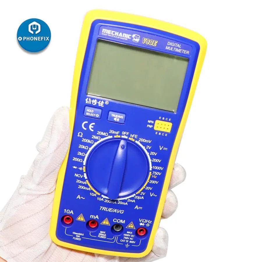 PHONEFIX Mechanic V90E digital multimeter with automatic display, showcasing its screen and measurement probes for electrical testing.
