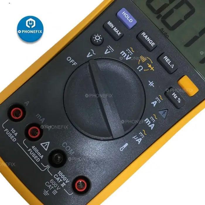PhoneFix Fluke 15B+ 17B+ 18B+ digital multimeter showing voltage and frequency measurements on a handheld device.