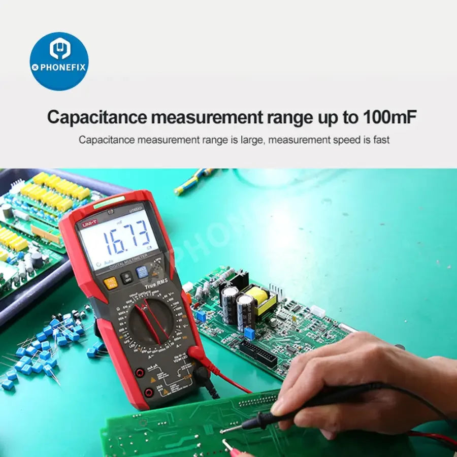 PHONEFIX UT89XD LED digital multimeter showing display of voltage, current, and capacitance measurement with test leads attached.