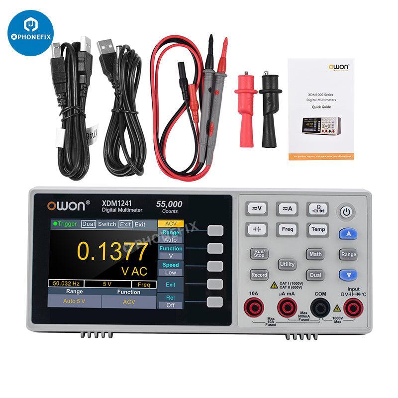 Phonefix digital multimeter measuring AC/DC voltage and current, compact tester with digital display for electronics testing.