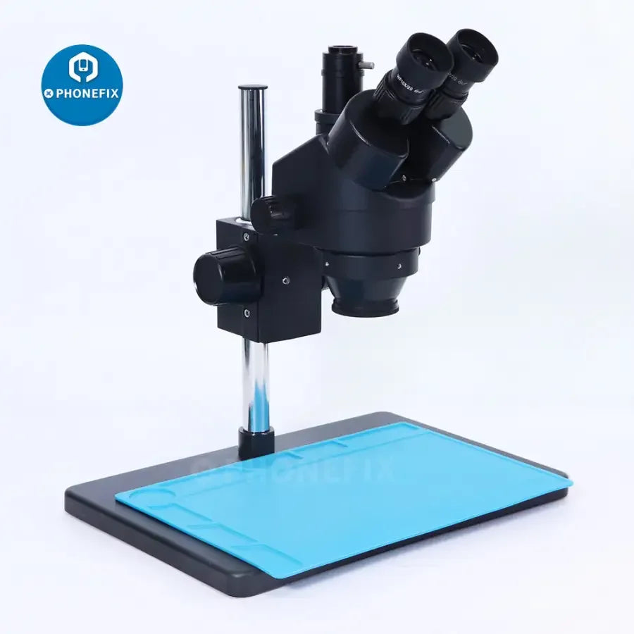 PhoneFix 7X-45X trinocular stereo zoom microscope on a table stand for PCB repair, with a black body and detailed optics.