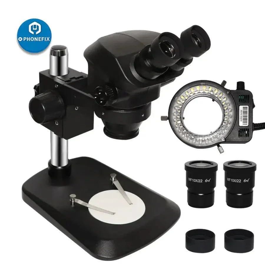 Black SIMUL Focal Binocular Stereo Microscope Head on table stand, used for detailed viewing and inspection.
