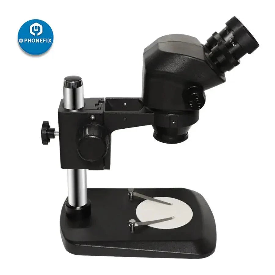 Black PHONEFIX electric stereo binocular microscope head with large table stand and focal adjustment for detailed microscopy work.