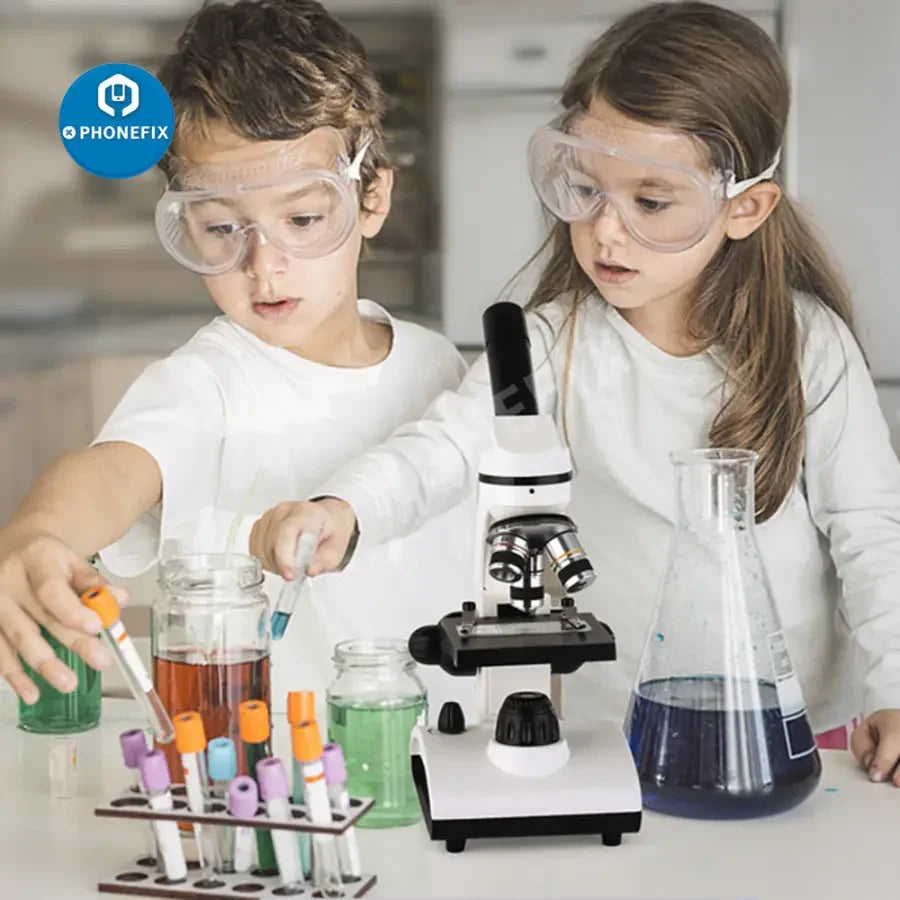 TELMU 40X-1000X electric student lab microscope with dual lenses and LED illumination, used for educational scientific observation.