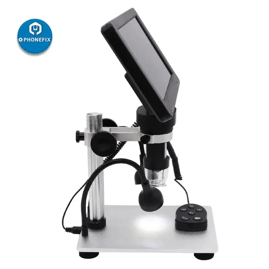 PHONEFIX DM9 1200X 12MP USB digital microscope with 7-inch display screen showing close-up of tiny objects and detailed magnified view.