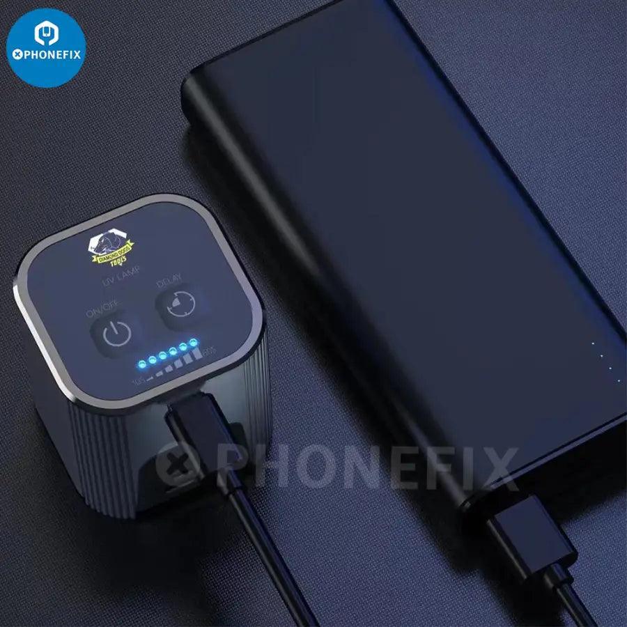 Qianli iUV Intelligent UV Curing Lamp with green oil LED and purple light, used for electronic repair and UV curing tasks.