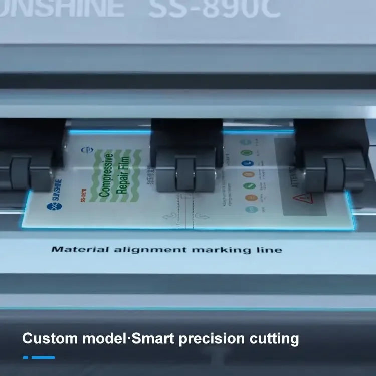 Flexible hydrogel repair film for cutter machine, PhoneFix SS-057R compressive repair film, shown in a film cutting machine.