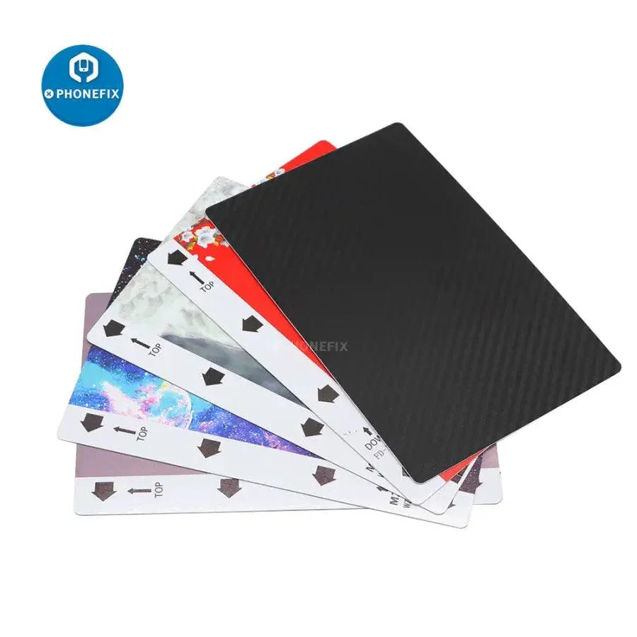 PhoneFix universal soft hydrogel film screen protector for film cutting machines, visible on the cutting device.
