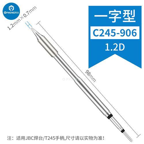 Pointe de fer à souder série JBC C245 pour station de soudage JBC, présentée sur un établi avec des outils et des composants électroniques.