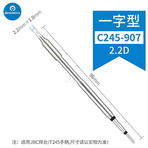 Pointe de fer à souder série JBC C245 pour station de soudage JBC, présentée sur un établi avec un fer à souder et des outils.
