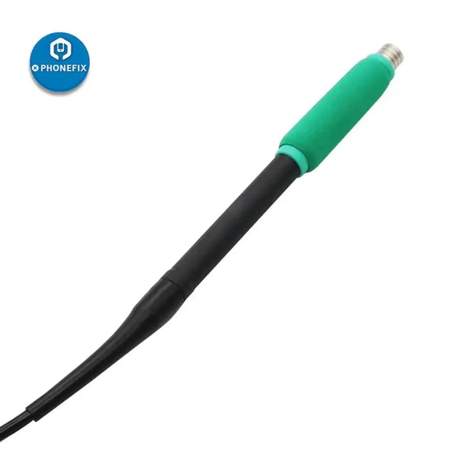 SUGON Precision T26 soldering iron handle for T26 soldering station, featuring ergonomic design and brand logo, in a workshop setting.