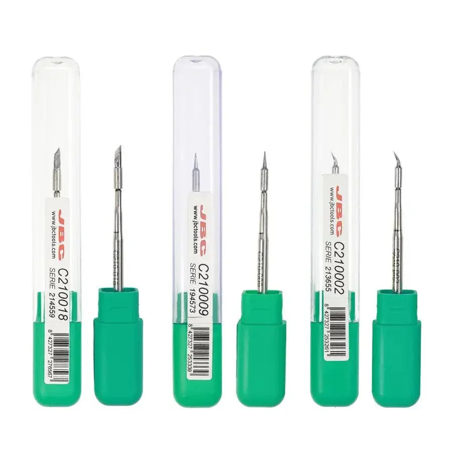 JBC C210 Series precision soldering iron tip for soldering irons, compatible with PHONEFIX tools, shown on a workbench.
