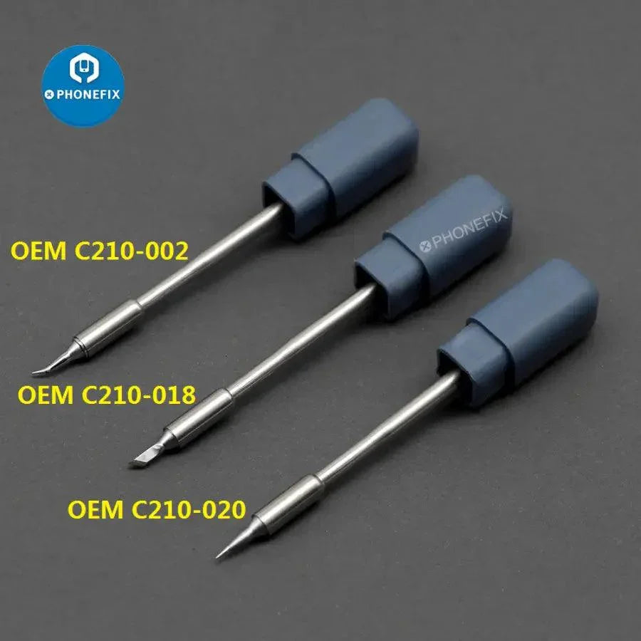 JBC C210 soldering iron tips C210002, C210018, C210020 for JBC T210 handle, shown on a workbench with tools and electronics