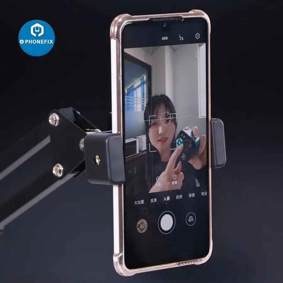 Overhead PhoneFIX articulating arm mount for live streaming camera, adjustable stand for studio shooting with smartphone.