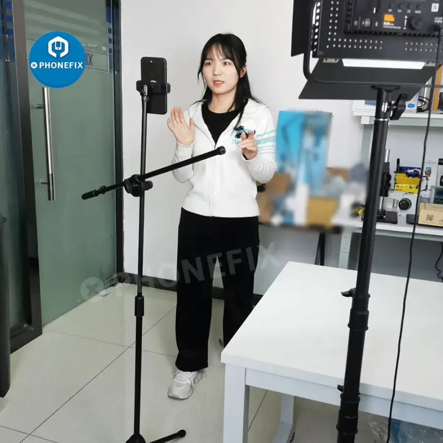 Trípode para webcam PhoneFix con brazo articulado de 64 cm para cámaras industriales y teléfonos, ideal para transmisiones en directo y configuraciones de vídeo profesionales.