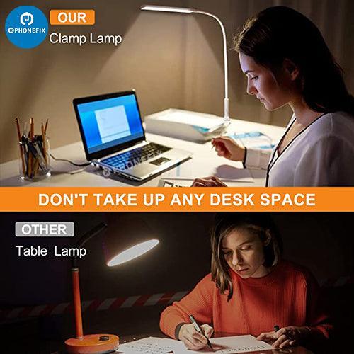 Flexible LED desk lamp with magnifying glass and 3 lighting modes for phone repair by PHONEFIX, shown on a workbench.
