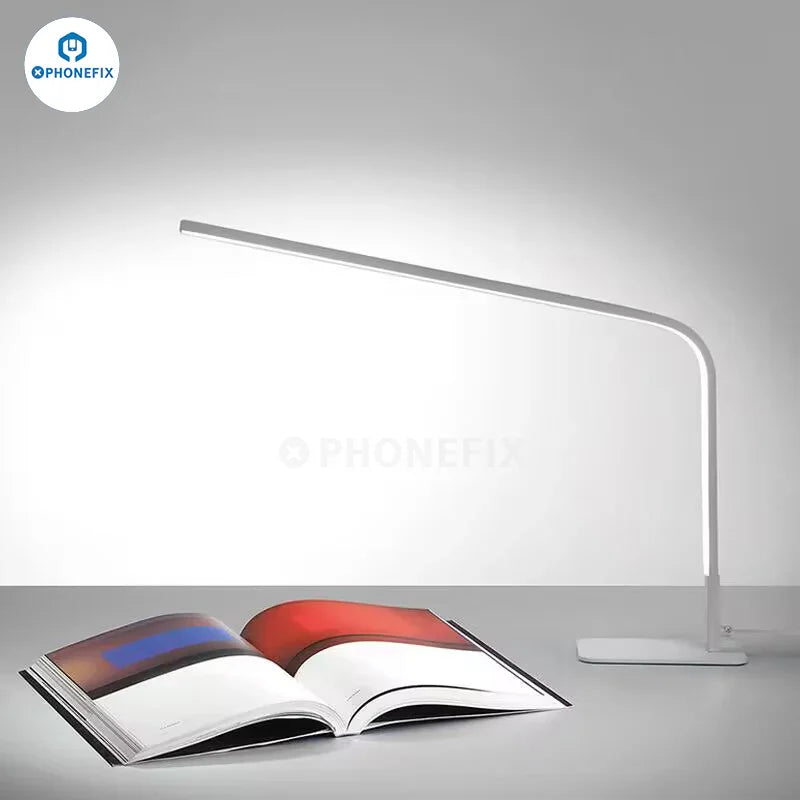 PHONEFIX 12W Smart LED desk lamp with magnifying glass, featuring adjustable brightness and three color options for detailed work.