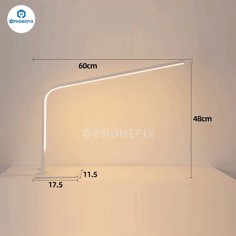 Lámpara de escritorio LED inteligente PHONEFIX de 12 W con lupa, luz ajustable y tres opciones de color para trabajar con concentración.