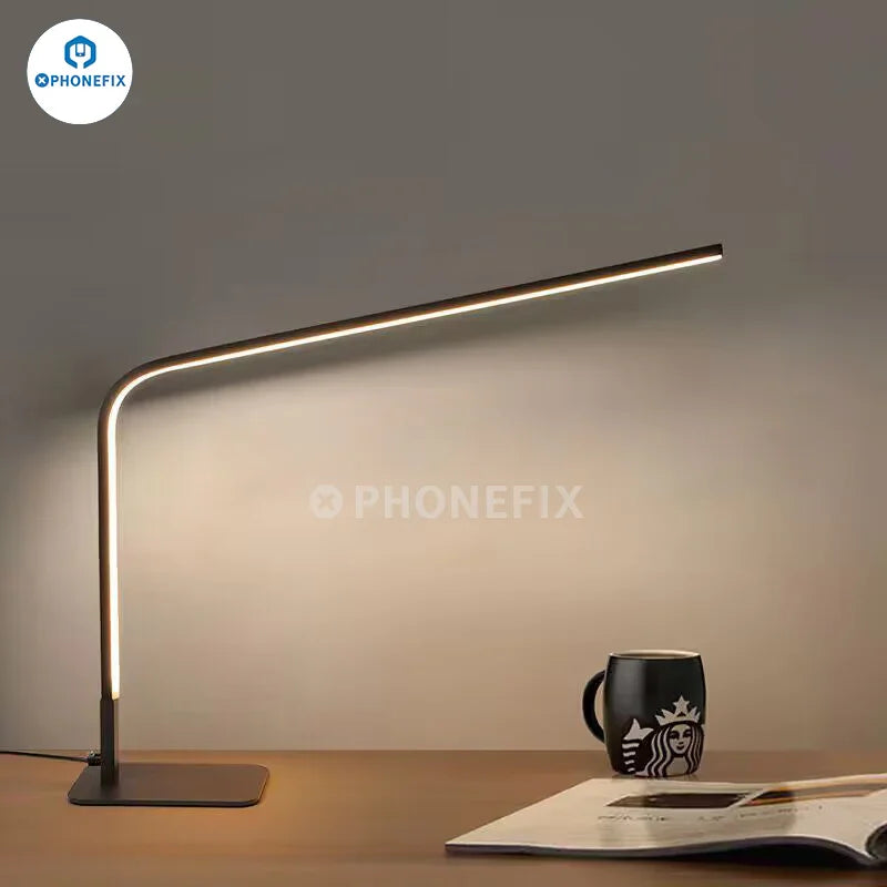 Smart LED desk lamp with magnifying glass, three color light options, powered by PHONEFIX, ideal for detailed work and reading.