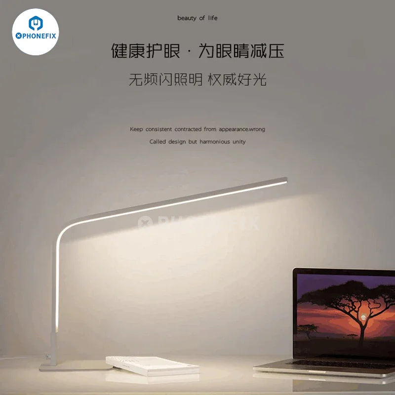 Lámpara de escritorio LED inteligente Phonefix de 12 W con lupa, brillo ajustable y tres opciones de color para una iluminación detallada.