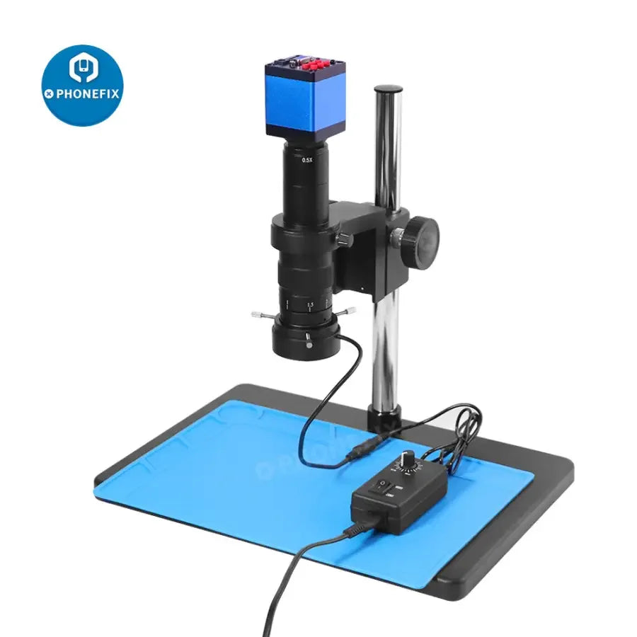 PHONEFIX 13MP HDMI VGA digital microscope camera set for PCB repair, showing close-up of circuit board inspection.