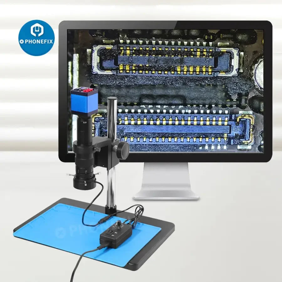 PHONEFIX 13MP HDMI VGA digital microscope camera set for PCB repair, featuring detailed close-up view of electronic circuit boards.